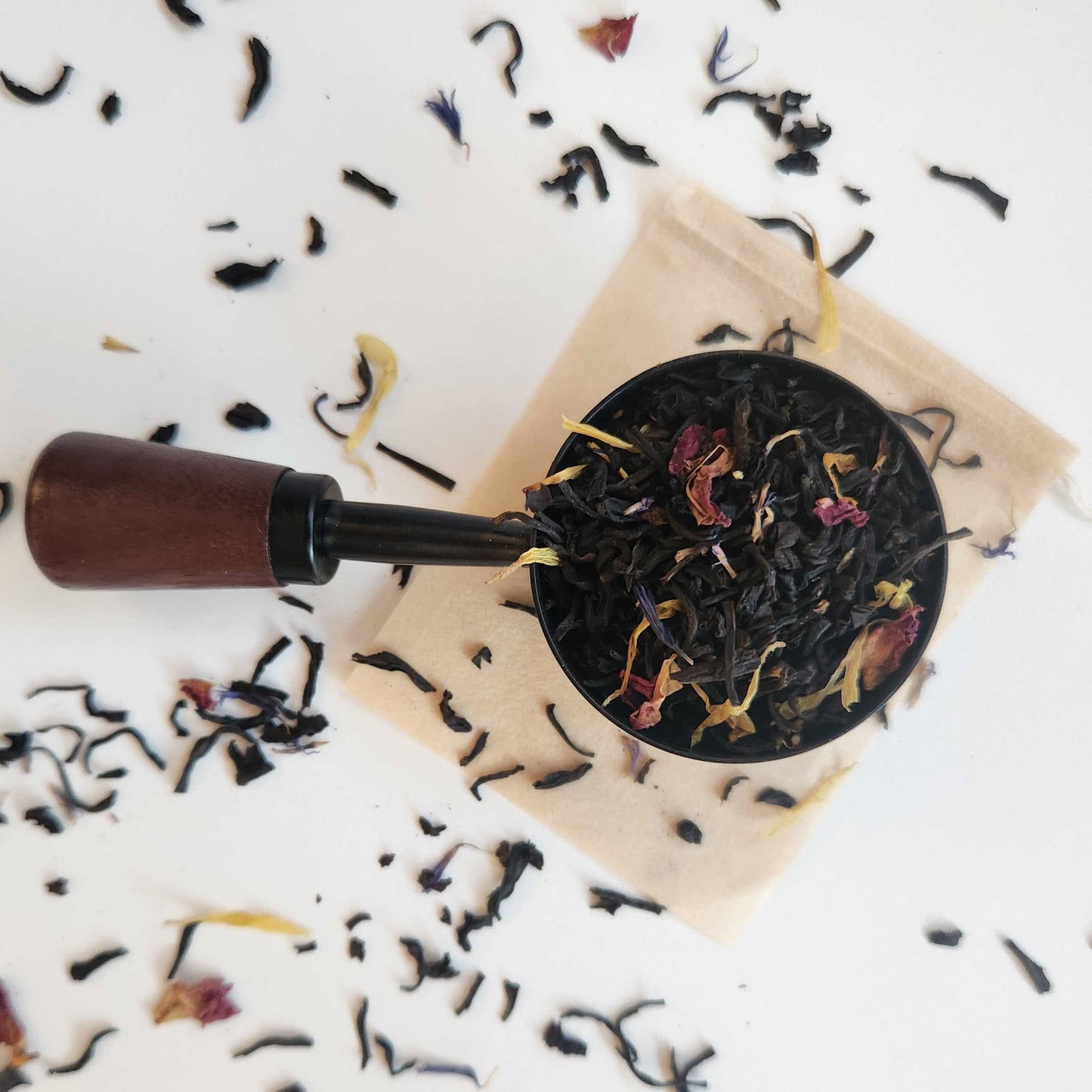 Monimo biodegradable and home compostable eco-friendly teabag pictured with French Earl Grey black tea.