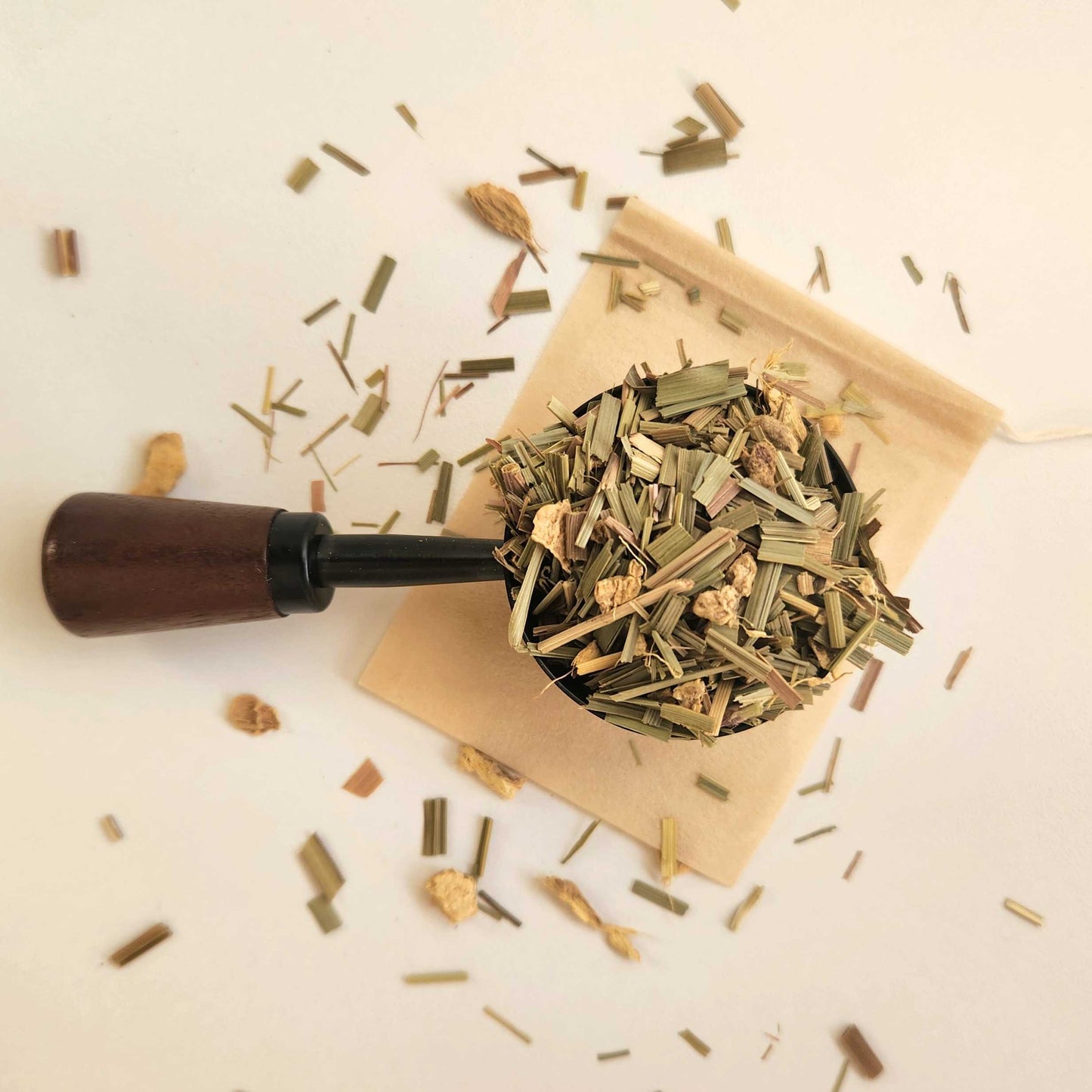 Monimo biodegradable and home compostable eco-friendly teabag pictured with Lemongrass and Ginger herbal tea.