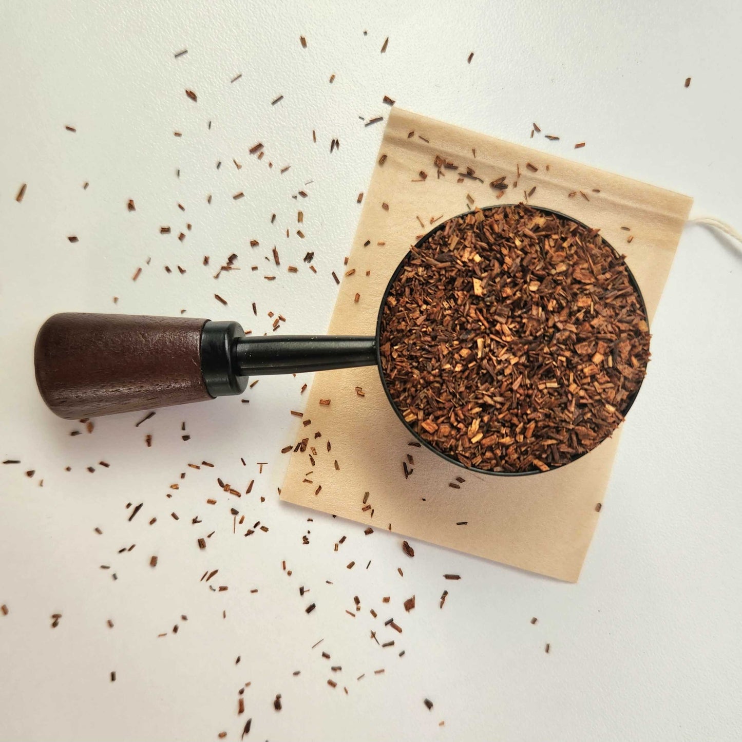 Monimo biodegradable and home compostable eco-friendly teabag pictured with Premium Rooibos tea.