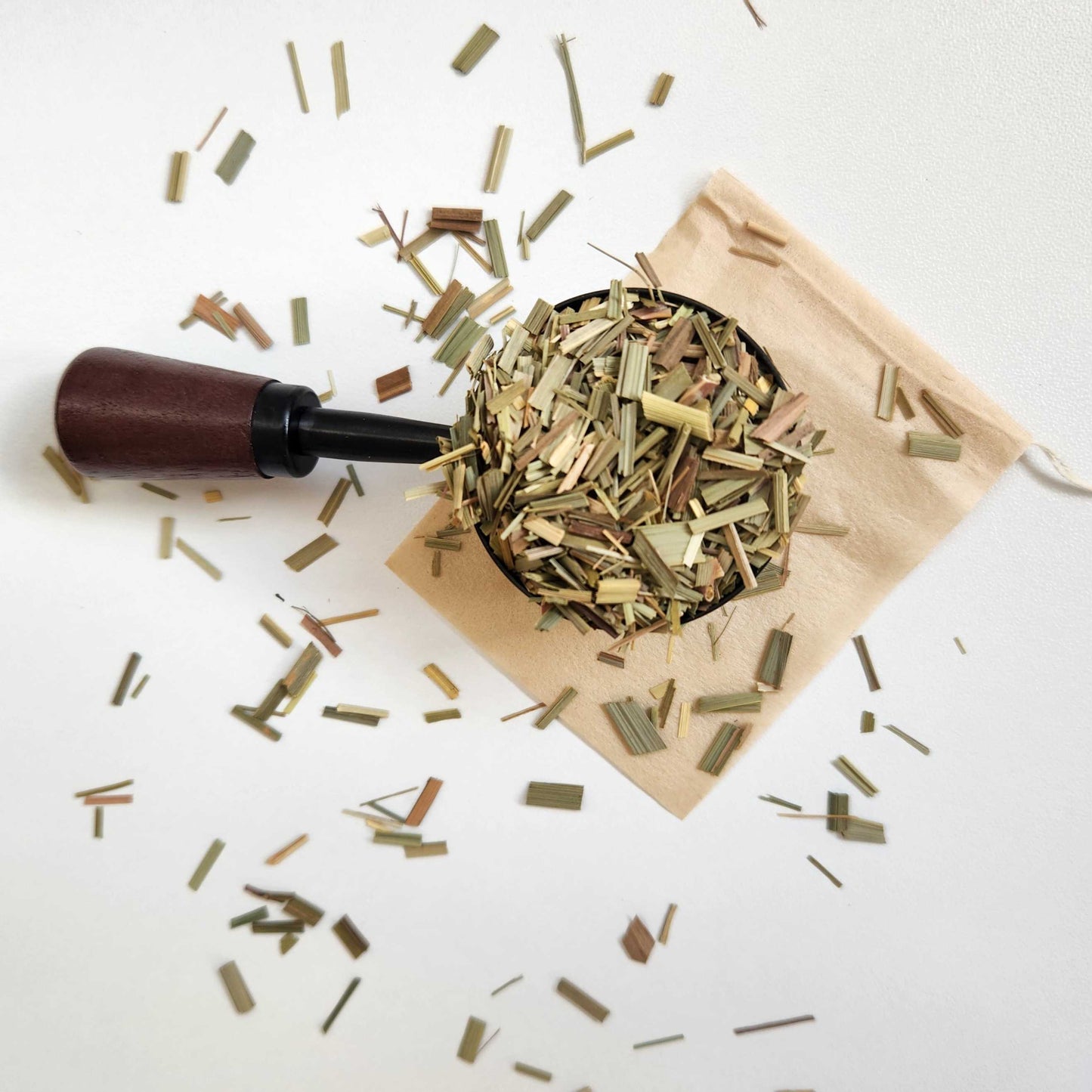 Monimo biodegradable and home compostable eco-friendly teabag pictured with lemongrass herbal tea.