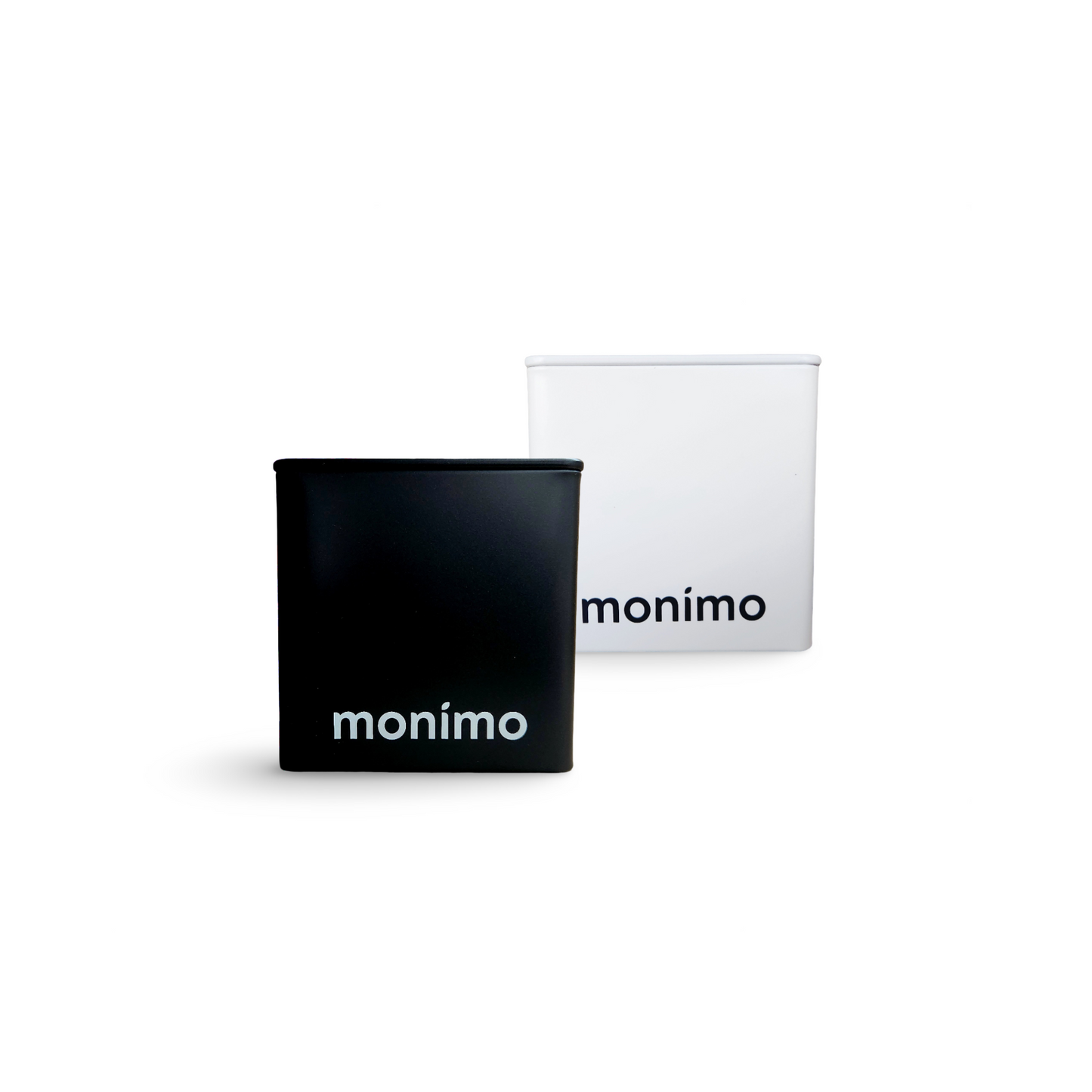 Monimo tea tins – reusable medium-size black and white metal containers for sustainable tea storage.