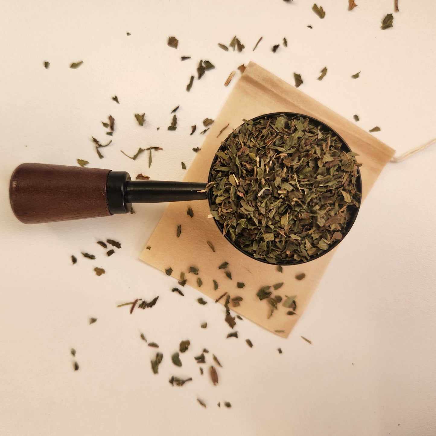 Monimo biodegradable and home compostable eco-friendly teabag pictured with Peppermint herbal tea.